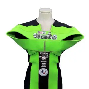 Green and black racing suit jacket on a mannequin.